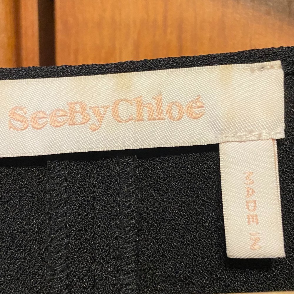 See by Chloe black ruffled 3/4 sleeve crepe-like boat neck blouse, size 4-EU 34 - Picture 2 of 11